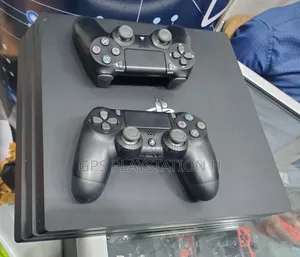 Photo - Playstation 4 Pro Model Ps4 1000gb