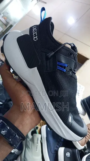 This Is a Blackout White Nautica Slip-on Athletics Sneakers