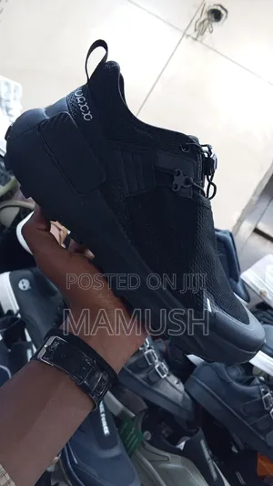 This Is a Blackout White Nautica Slip-on Athletics Sneakers