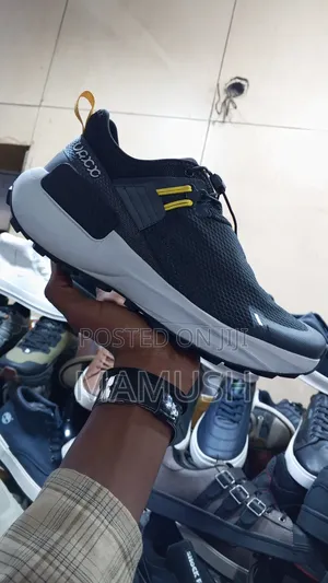 This Is a Blackout White Nautica Slip-on Athletics Sneakers