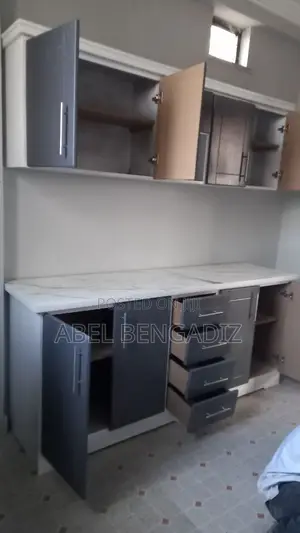 Photo - ዘመናዊ የሆኑ ጥራታቸውን የጠበቁ ተሰቃይ የሆኑ ኪችን ካቢኔቶች