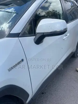 Photo - Toyota RAV4 Hybrid 2022 White