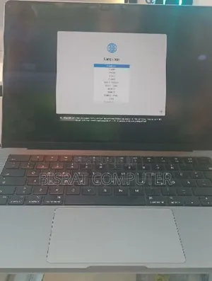 Photo - New Apple MacBook Pro 2023 M3 14-Inch 24GB Apple M3 Pro SSD 512GB