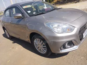 Photo - Suzuki Dzire 2023 Silver