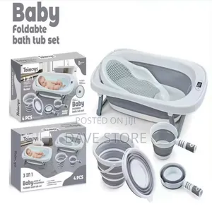 Photo - 4 in 1 Foldable Baby Bathtub With a Thermometer and a Ladle
