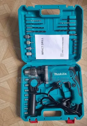 Photo - Makita Bosch Drill With Accessories