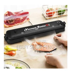 Photo - No-Mess, Easy-Clean Home Vacuum Sealing Machine