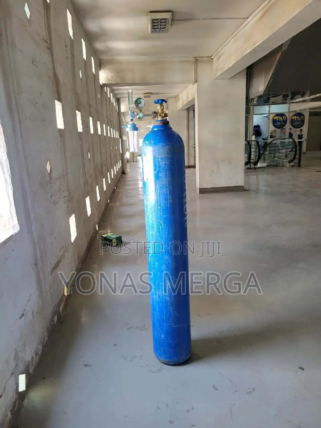 Oxygen Cylinder With Gage=Typical for Controlled Delivery of the Gas.