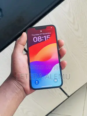 Photo - New Apple iPhone 13 128 GB Blue