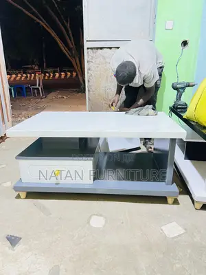 Photo - ቅልብጭ ያለች የሶፋ ጠረቤዛ ለ L-Shape ሶፋ ለጠባብ ቤት የሚሆን በፈለጉት የዲዛይን እና የከለር አማራጭ