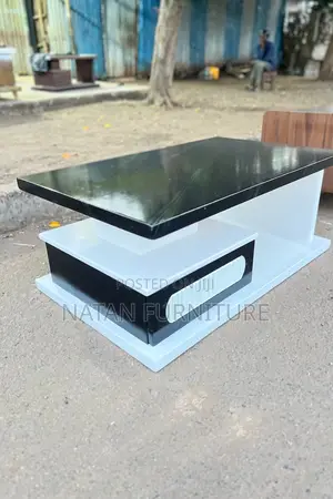 Photo - እጥር ምጥን ያለች የሶፋ ጠረቤዛ ለኪራይ ቤት የሚሆን ጥራቱን በጠበቀ ግብአት የተሰራ