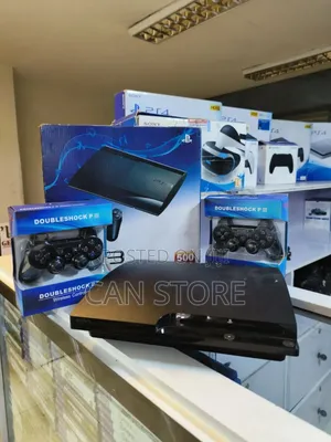 Photo - Playstation 3 Slim ከካርቶኑ ጋር የመጣ