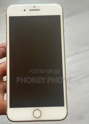 Photo - Apple iPhone 7 Plus 128 GB Gold