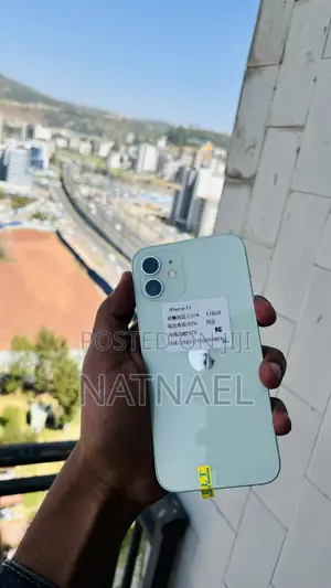 Photo - New Apple iPhone 12 128 GB Yellow