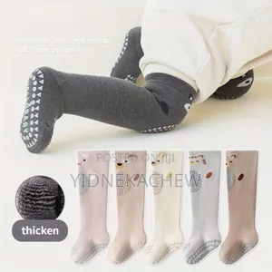 Photo - Anti Slip Baby Socks(መዳህ ለሚለማመዱ ልጆች)