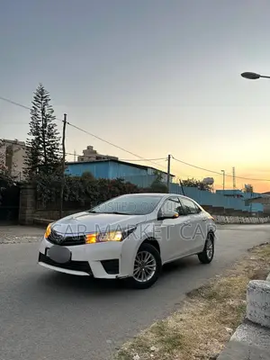 Photo - Toyota Corolla LE Eco 4dr Sedan (1.8L 4cyl CVT) 2016 White