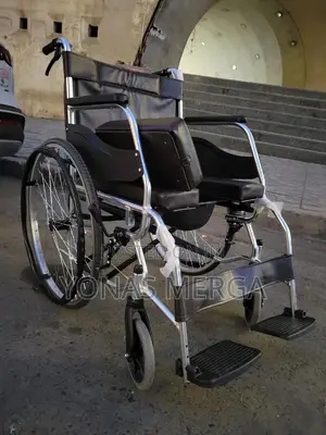 Toilet Wheelchair With a Folding Frame for Easy Everyday Travel