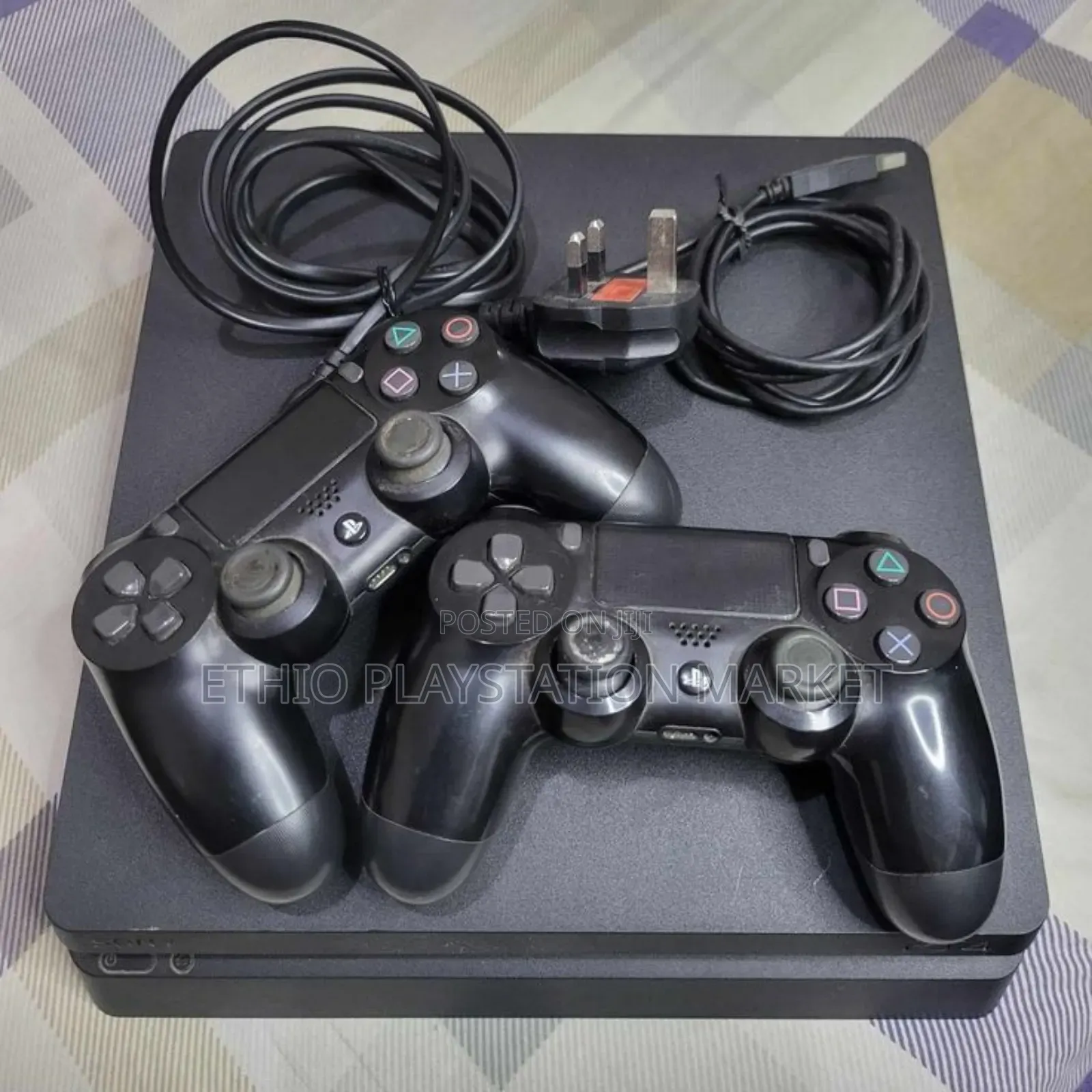 Playstation 4 Slim ከነጋዴ ባነሰ ዋጋ