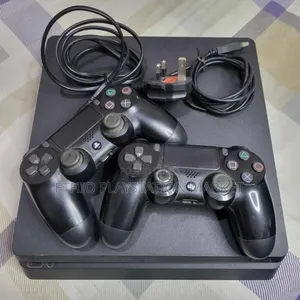 Photo - Playstation 4 Slim ከነጋዴ ባነሰ ዋጋ