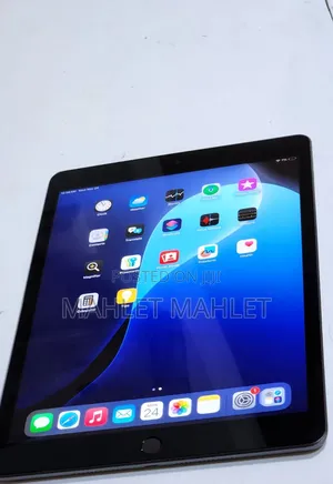 Photo - New Apple iPad 9.7 64 GB