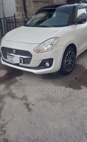 Photo - Suzuki Swift 2022 White