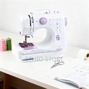 Photo - Mini Portable Home Sewing Machine With Foot Padal
