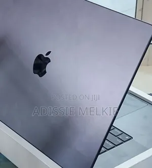 Photo - New Apple MacBook Pro 2023 M3 14-Inch 18GB Intel Core I7 SSD 512GB