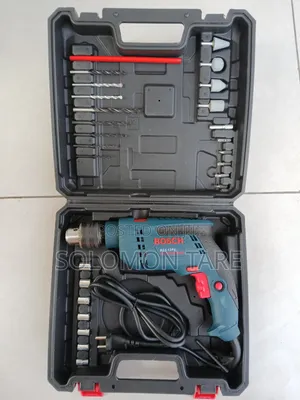 Photo - Bosch Drill With Accessories