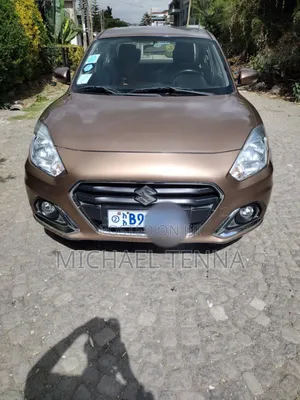 Photo - Suzuki Dzire 2021 Gold