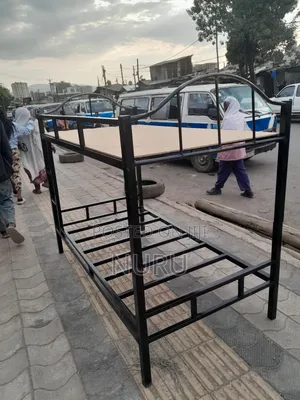 Photo - የብረት ተደራራቢ አልጋዎች