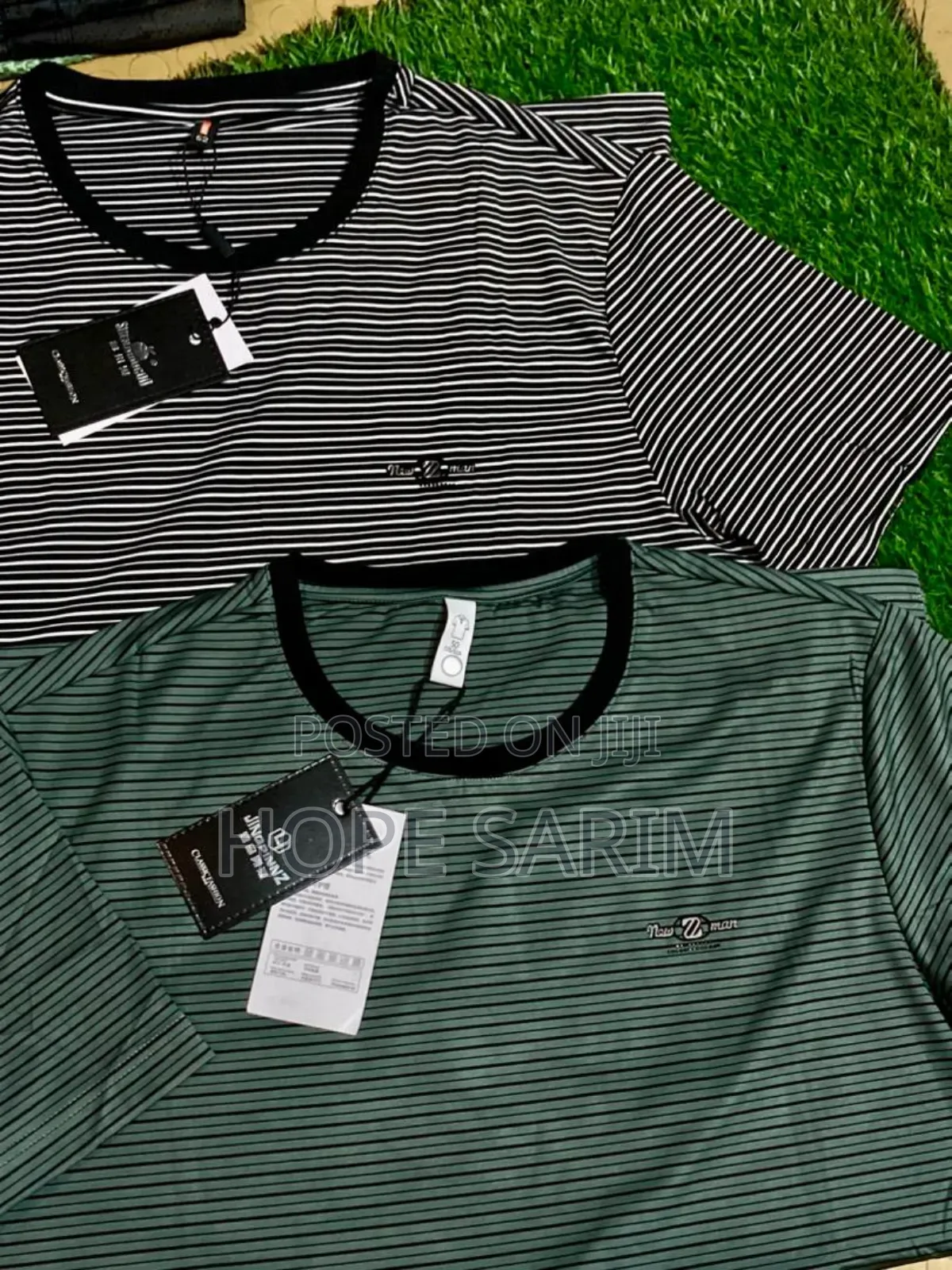 T Shirts አንገታቸው O