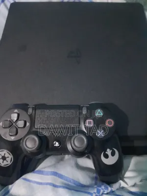 Photo - Play Station 4 Slim With 20 Games