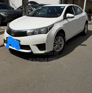 Photo - Toyota Corolla L 4dr Sedan (1.8L 4cyl Manual) 2016 White