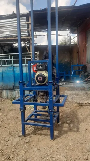 Photo - የከርሰምድር ውሃ ቁፋሮ ማሽን