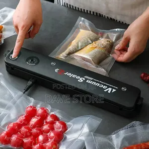 Photo - Automatic Vacuum Sealer Machine የላስቲክ ማሸጊያ