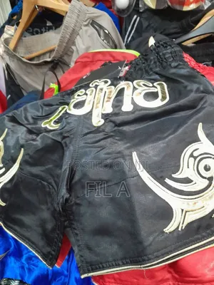 ' Muay Thai Kickboxing Shorts in Pink Satin.