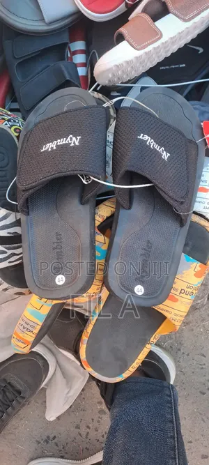 Photo - Black Nymbler Brand Slide Sandals In