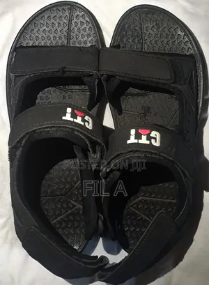 This Is a Pair of Black Nymbler Brand Slide Sandals in Size