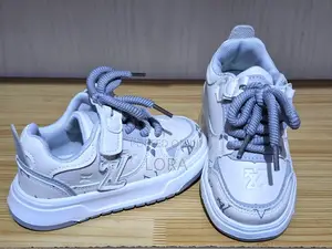 Photo - Child Shoe ጫማ