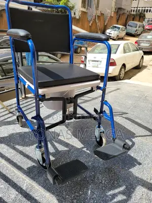 Photo - Toilet Chair台爻wheelchair With Removable Armrest,Commode Bin, Leg Rests