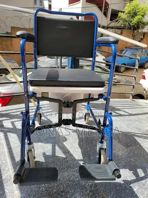 Photo - Folding 4-in-1 Commode Chair与麊easy to Clean: The Commode Bucket