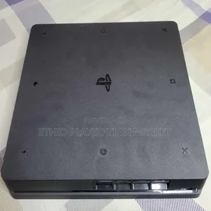 Photo - Playstation 4 Slim Game በነፃ