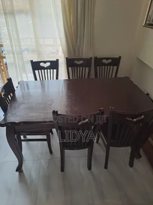 Photo - Dark Brown Dinning Table