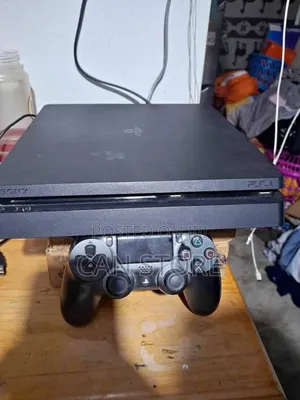 Photo - Playstation 4slim With 2joystick Five New Games Ps