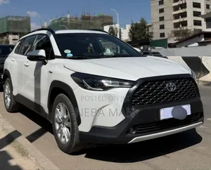 Photo - Toyota Corolla Cross Hybrid 2023 White