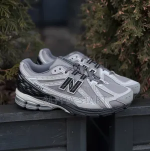 New Balance 1906r Sneaker in the Castlerock With Rain Cloud and Black